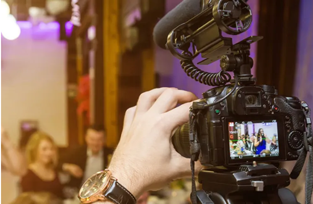 Photographer with video